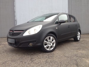OPEL CORSA car wrapping nero opaco, vetri oscurati e fari oscurati thiene vicenza