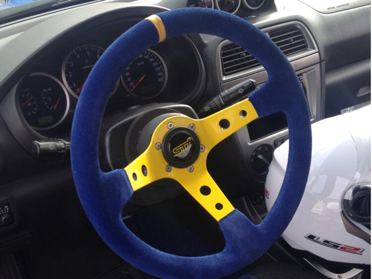 SUBARU IMPREZA WRX STI - rivestimento volante e logo Sti resinato