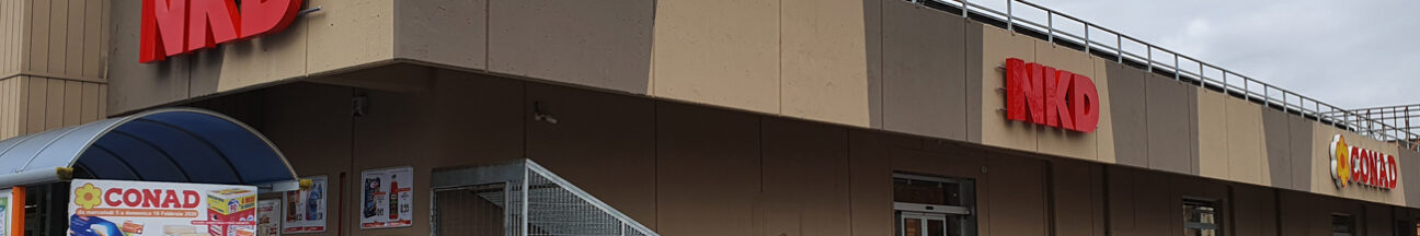 allestimento-negozio-nkd-aprilia decorazione adesivi insegne