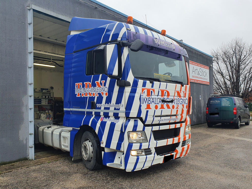 motrice-MAN camion-decorazione-cast-prespaziati-trn car wrapping arancione blu