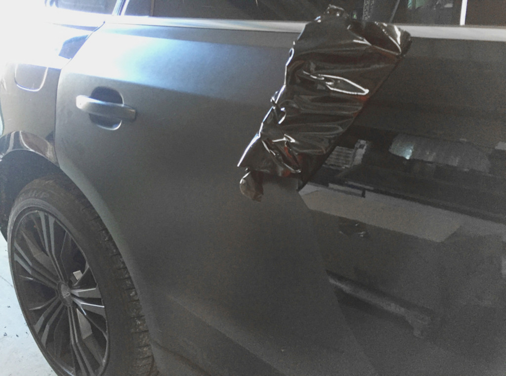 Audi Q5 - rimozione pellicola da auto wrappata